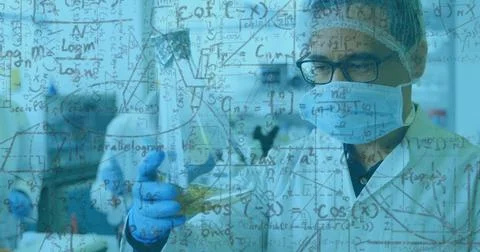 Scientific formulas and equations image over scientists conducting experiments Stock Photos