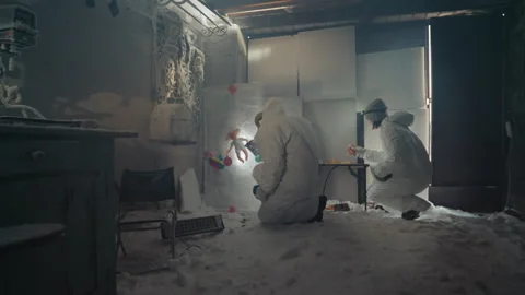 Scientific investigation process. Scientists meticulously document radioactive Stock Footage 346521716