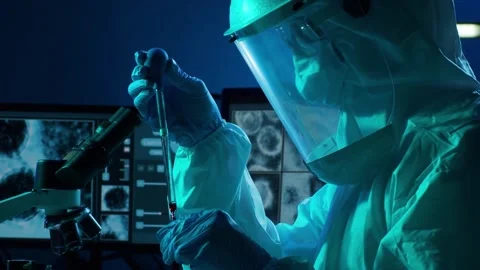 Scientific laboratory filled with various research equipment. Scientists are Stock Footage 304516833