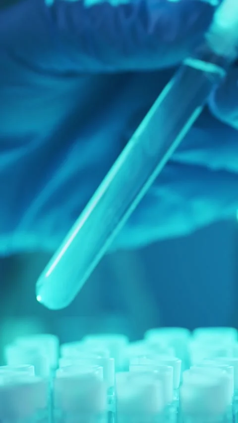 Scientific laboratory filled with various research equipment. Scientists are Stock Footage 304525465