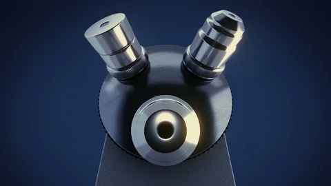 Scientific laboratory microscope in dark laboratory changing its metal lenses Stock Footage 114979081