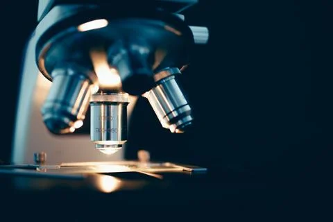 Scientific microscope in modern clean laboratory light Stock Photos