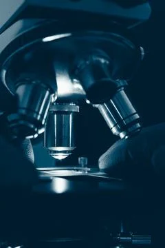 Scientific microscope in modern clean laboratory light Stock Photos