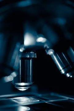 Scientific microscope in modern clean laboratory light Stock Photos