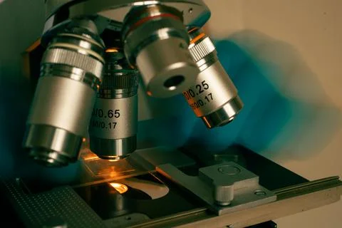 Scientific microscope in modern clean laboratory light Stock Photos