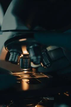 Scientific microscope in modern clean laboratory light Stock Photos