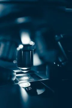 Scientific microscope in modern clean laboratory light Stock Photos