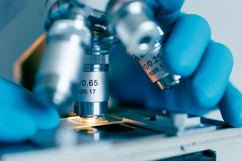 Scientific microscope in modern clean laboratory light Stock Photos