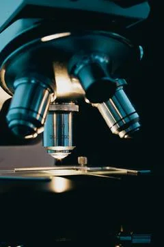 Scientific microscope in modern clean laboratory light Stock Photos