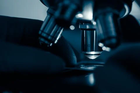 Scientific microscope in modern clean laboratory light Stock Photos