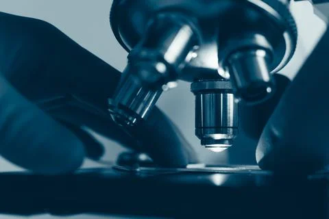 Scientific microscope in modern clean laboratory light Stock Photos