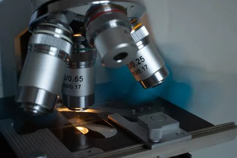 Scientific microscope objective in lab light Stock Photos