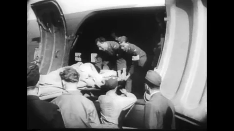 The scientific process for making penicillin is shown, and wounded soldiers are Stock Footage 143857676