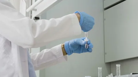 Scientific research. Scientist doing tests in chemical laboratory. 4K Stock Footage 96102871