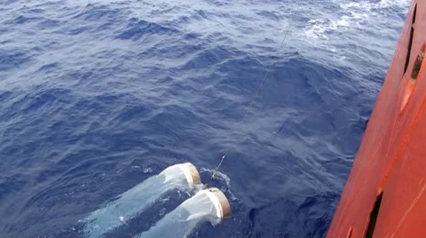 Scientific taking samples of an ocean microorganisms from a Bongo nets Stock Footage 36458448