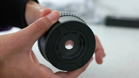 Scientist adjusting microscope aperture light source 스톡 동영상 232007560