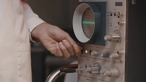 Scientist adjusting the oscilloscope settings in the lab Stock Footage 116189411