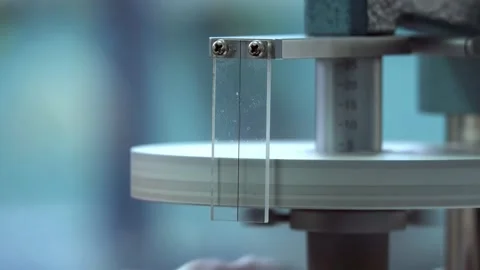 Scientist adjusts the dial gauge. Stock Footage 154608685