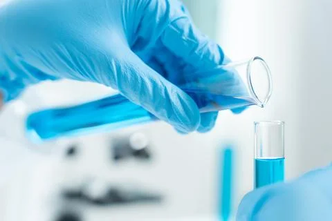 Scientist analyze biochemical sample in advanced scientific laboratory. Med.. Foto stock