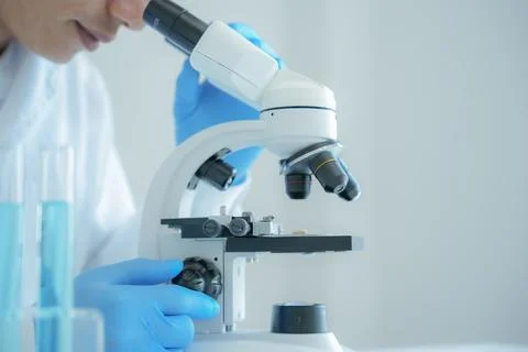 Scientist analyze biochemical samples in advanced scientific laboratory. Me.. Stock Photos