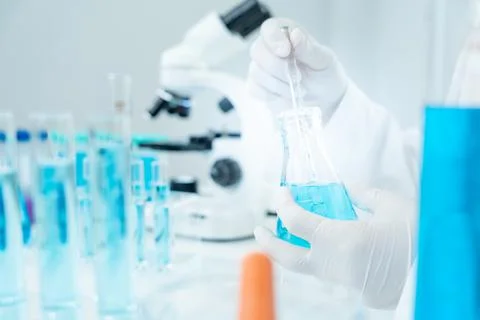 Scientist analyze biochemical samples in advanced scientific laboratory. Me.. Fotos Stock