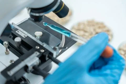 Scientist analyze biochemical samples in advanced scientific laboratory. Me.. Fotos Stock
