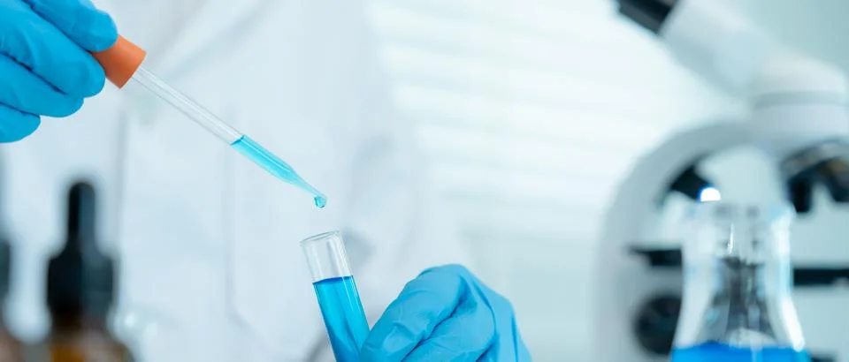 Scientist analyze biochemical samples in advanced scientific laboratory. Me.. Stock Photos