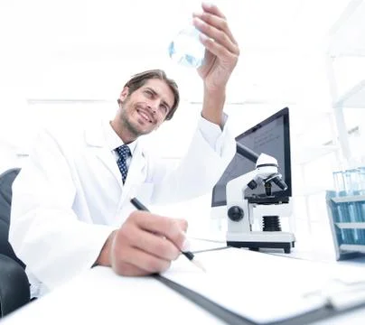 Scientist analyzing an experiment in a laboratory Stock Photos