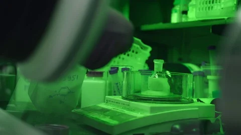 Scientist arms working in lab vacuum box for research of biological substances Stock Footage 104583269