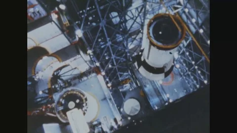Scientist assemble Saturn V rocket part by part at assembly line - 1968 Stock Footage 90450151