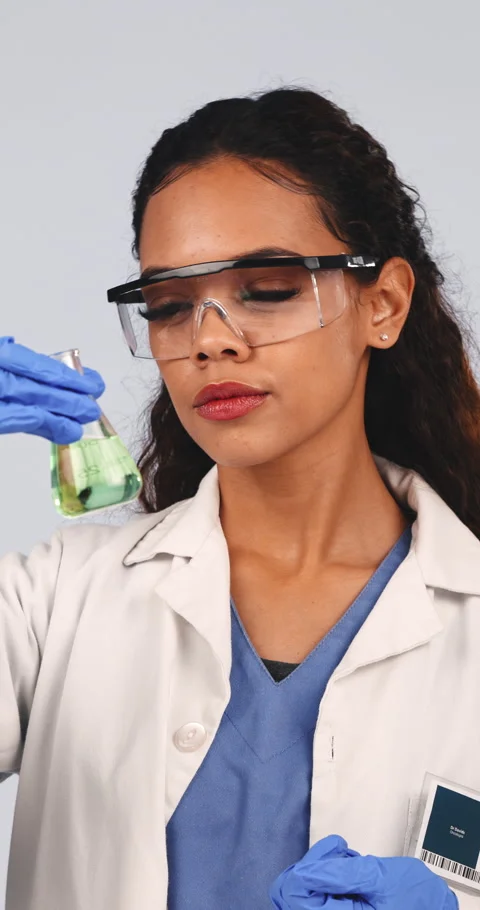 Scientist, beaker and liquid in studio for chemistry, research and medical study Vídeo Stock 336847835
