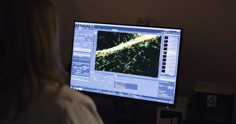 Scientist checking material through digital microscope Stock Footage 104334830