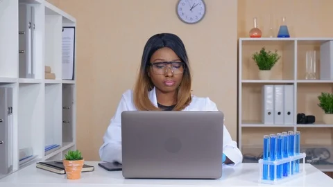 Scientist checking result and entering data Stock Footage 87537212