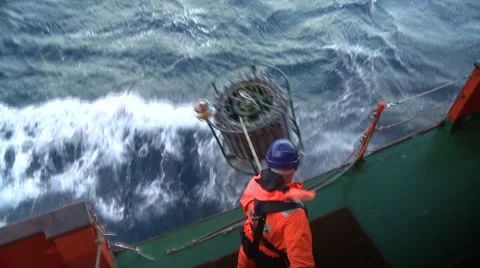 Scientist collecting oceanographic rosette CTD Stock Footage 46392905