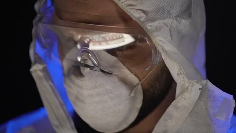 Scientist combining elements in test tube, manufacturing biological weapons Stock Footage 85079891