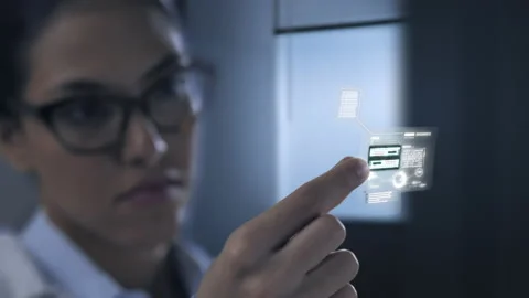 Scientist computer engineer holding microchip hardware processing data Stock Footage 194092544