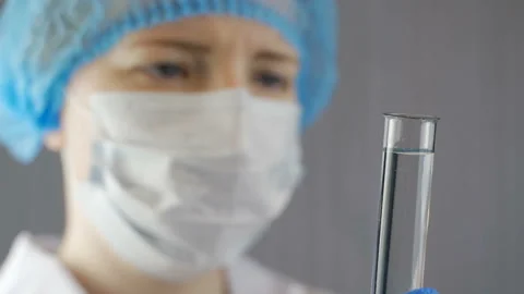 Scientist conducting research in laboratory 動画素材 101971495