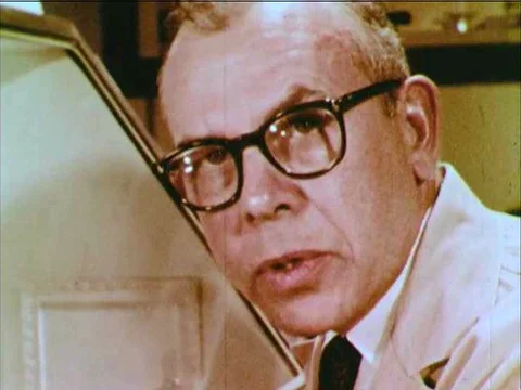 A scientist conducts an experiment on the oxidation of radioactive elements, Video stock 75417369