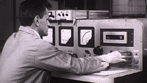 Scientist at Control Panel Monitors Missile Test Launch 1960s Vintage Film Movie Stock Footage