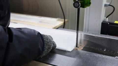 Scientist cutting a core sample of ice in a laboratory for global warming Stock Footage 116308619