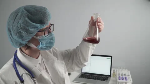 Scientist developing a medicine. Vaccine development. Disease control. Stock Footage 155557109