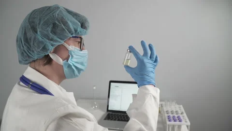 Scientist developing a medicine. Vaccine development. Disease control. Stock Footage 155557603