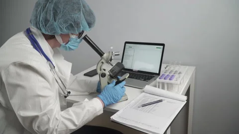 Scientist developing a medicine. Vaccine development. Disease control. Stock Footage 156421740