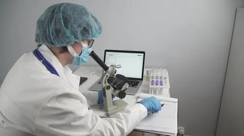 Scientist developing a medicine. Vaccine development. Disease control. Stock Photos