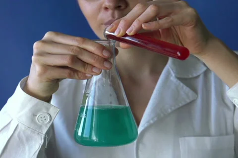 Scientist doing chemical experiment, super slow motion, shot at 240fps NTSC Stock-Footage 36807429