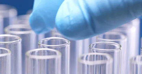 Scientist doing experiment with test tube Stock Footage 82996088