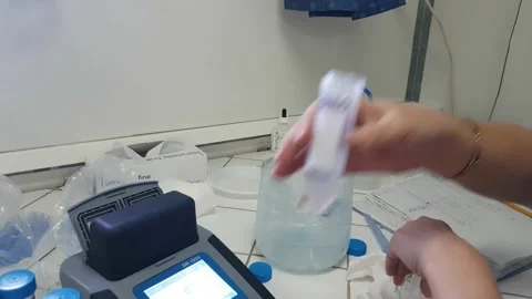 A scientist doing a research and working at the lab Stock Footage 138890718