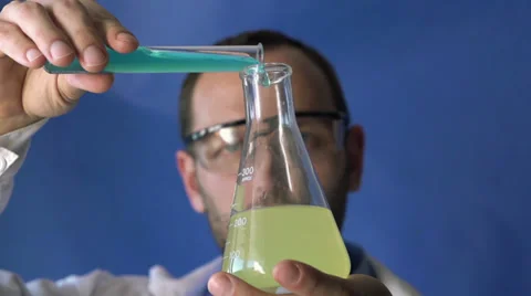 Scientist doing science experiment, super slow motion, shot at 240fps HD Stock Footage 36806786