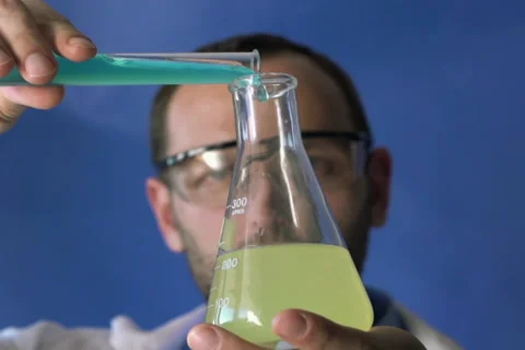 Scientist doing science experiment, super slow motion, shot at 240fps NTSC Stock Footage 36806794