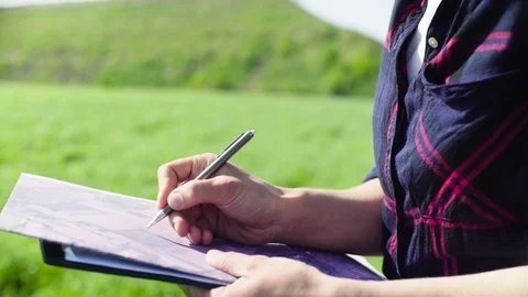 The scientist ecologist during the research. Stockbeeldmateriaal 90022331